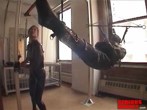 Suspended In Leather Straitjacket Sack