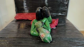 Gasmask Lilou gets piss shower after latex fuck