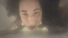 Nastya tests a case for underwater shooting (wet flowing hair)