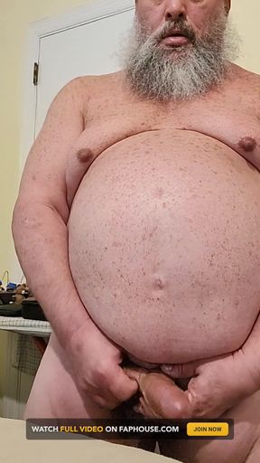 Bear Gene Wade Strokes His Big Cock and Cums