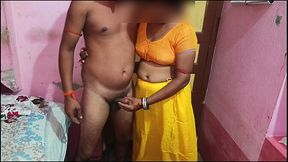 Indian big aunty in yellow saree and blouse gives a horny blowjob to