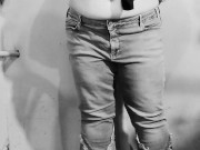 Chubby MILF strips naked in the basement, showing off her big ass and curvy figure
