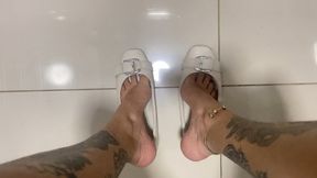 in slippers while my slave serves me