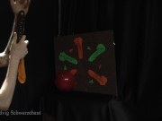 Nicky as a superhero destroys balloons
