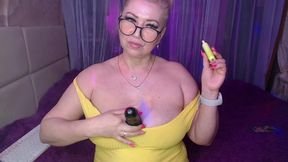 a cool busty vulgar mature whore in glasses with a ponytail on her head...