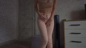Desperate 18-year-old brunette babe pees in her jeans