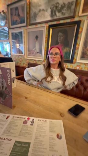 British babe flashes her big tits in a pub