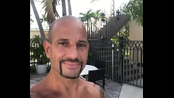 OUTSIDE BY THE POOL