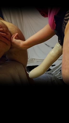 She fucks her boyfriend deep in his ass with a big dildo strapon