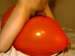 Big inflatable orange balloon humping cum