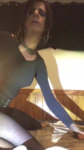 Kina Enjoying Riding on Top of Her Black Toy
