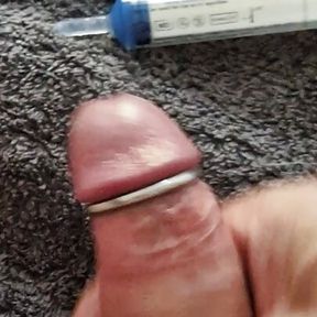 Playing with my uncut cock, ring around my glans. Squirting lube in my dick and jerking off until I come