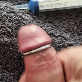 Playing with my uncut cock, ring around my glans. Squirting lube in my dick and jerking off until I come