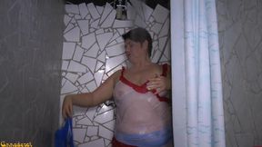 Wet Anna Devot in the shower in bikini