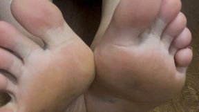 Rubbing my dirty feet