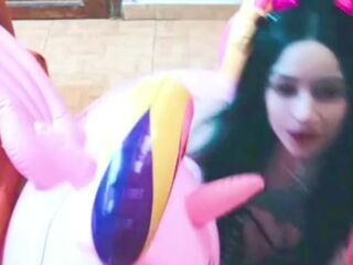 Cosplay cutie has pleasure with a pink inflatable unicorn