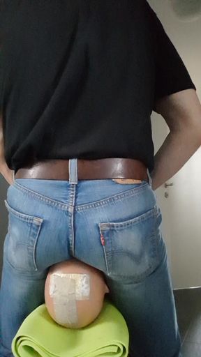 My jeans-butt riding the face of my sitting-doll