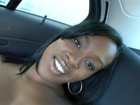 Ebony bitch with big ass rides a white cock in a car