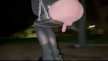 TEEN TRANS ON A SWING IN PUBLIC FLASHING DICK