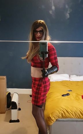 Showing off red tartan skirt