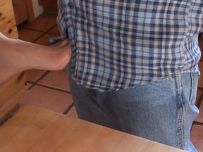 Brunette pleasing him in the kitchen