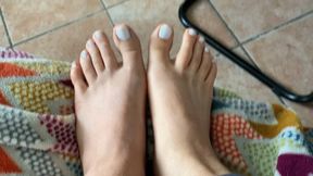 close up of my beautiful feet with white nail polish