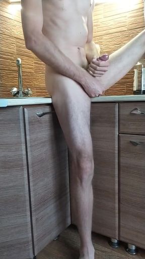 Handjob in the kitchen