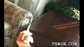 Elegant hottie smokes a cig
