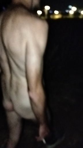 Naked walking on the hill along highway