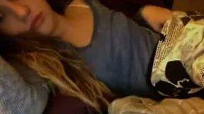 Nasty brunette college girl cuddles in her bed and masturbates