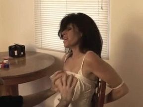 Tied up after she loses at poker