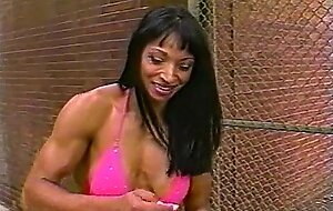Fitness girl showing off great body outdoors