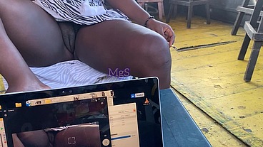 Slutty African whore goes public flashing in a hood bar
