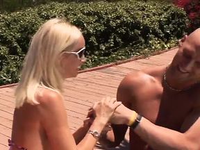 Bald stud titty fucks and gets head from a stunning MILF, then fucks her