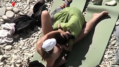 Beach Voyeur. Unashamed nudists having sex on the beach right near others