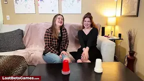 Busty lesbians play strip cup game
