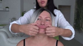 giving her BIG fish lips and pinching her stretchy face b