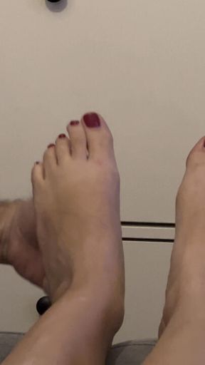 Home slave massage my feet while watching a movie