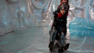 Batwoman cosplayer overpowers Catwoman and teases her pussy