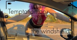 Temptation on the windshield of a car