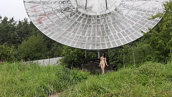 Naked on an old space communications station.