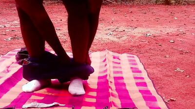 Naughty black dude strips in a park and shows his amazing ass