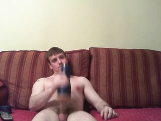 Watching porn playing with a blue fleshlight