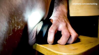 Fucking a swollen dick with rubber sleeve and cum in him off!