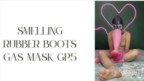 smelling pink rubber boots in gas mask