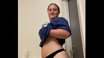 Nurse stripping in bathroom