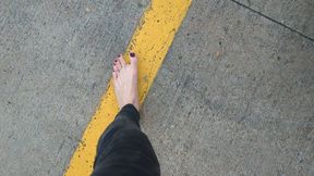 Fifi fast driving barefoot in skinny black jeans with jewelry