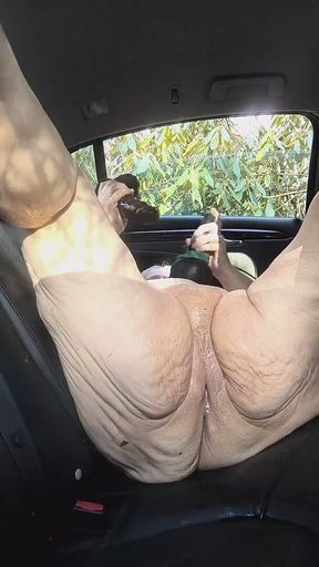 In the Backseat This Fat Slut Beating Her Meat