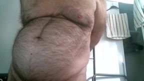 Coach Karl Shows off His Furry Belly
