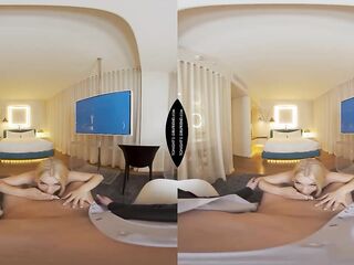 Draped in her finest, blond cutie Jazlyn Ray prepares to greet her client with a look designed for maximum impact